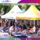 Karyawan Bank Sultra bergotong royong melakukan pembagian hewan kurban di Tower Bank Sultra, Senin (17/6/2024).