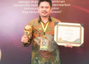 Bupati Koltim Terima Penghargaan UHC, Dukung Program JKN dan SDGs 2030
