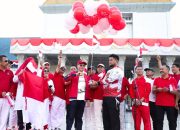 Semangat HUT ke-79 RI, Sekda Asrun Lio Distribusi Ribuan Bendera Merah Putih ke Masyarakat Sultra