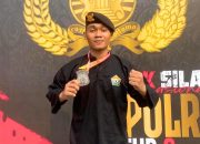 Medali Perak Kapolri Cup 2 2024, Bripda Harya Alimin Harumkan Nama Kendari di Pencak Silat