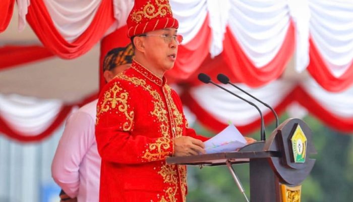 Andi Sumangerukka Pakai Baju Adat Tolaki Saat Pimpin Upacara Harganas